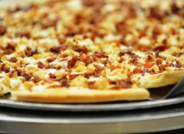 Pizza Slice-A different type of pizza is available every day. Check the menu!