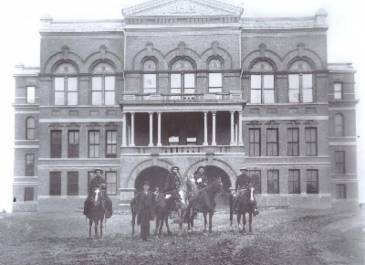 Old Capitol Built 1883 - Burned Dec. 28, 1930-Man on ground Gov. John Burk, ND's 10th gov.