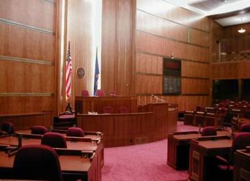 Senate Chamber-Wood on walls is quarter-sawed English Oak. Lighting represents a sunset.