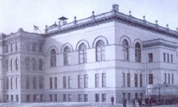 Old capitol building with a trolley car next to it